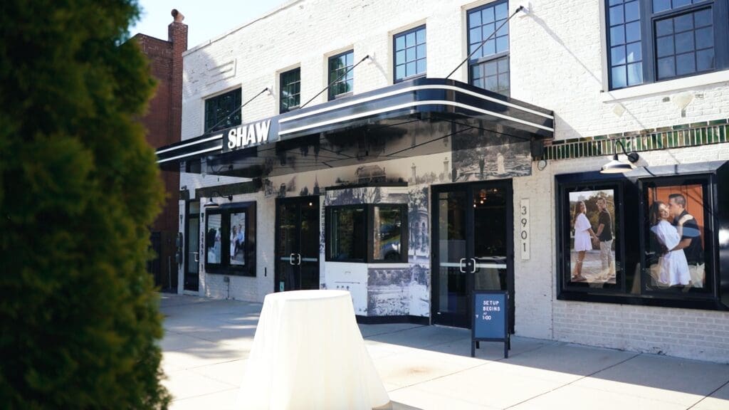Wild Carrot wedding venue in St. Louis with industrial brick exterior and marquee entrance for cinematic portraits